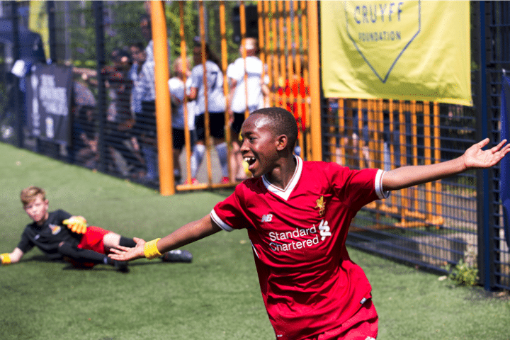 boy playing football