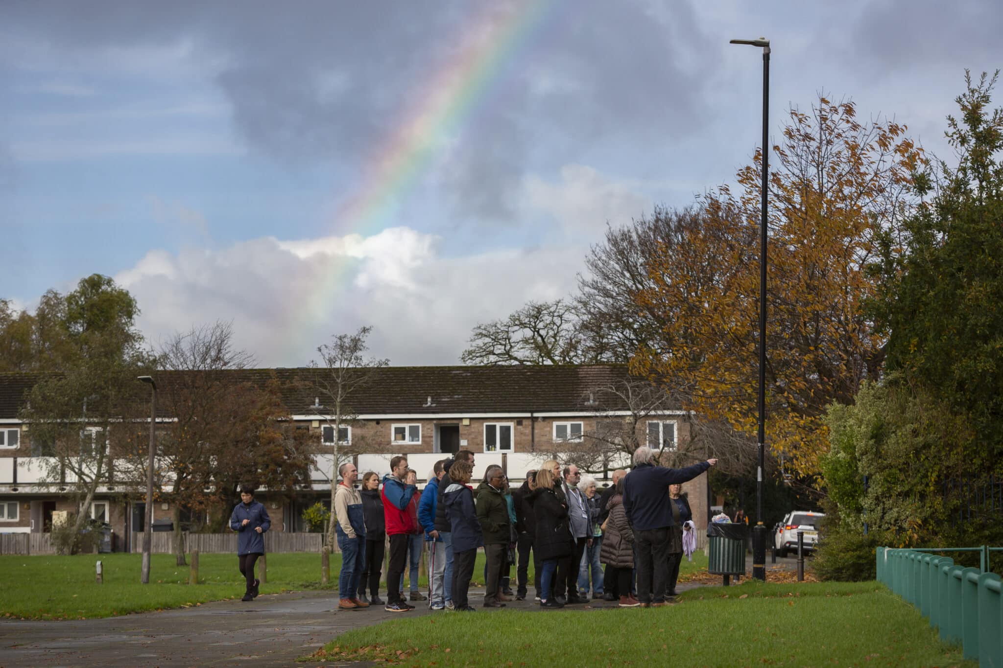 Big Local volunteers and workers take a tour around Sale West Big Local's community spaces, at the Big Local climate residential.