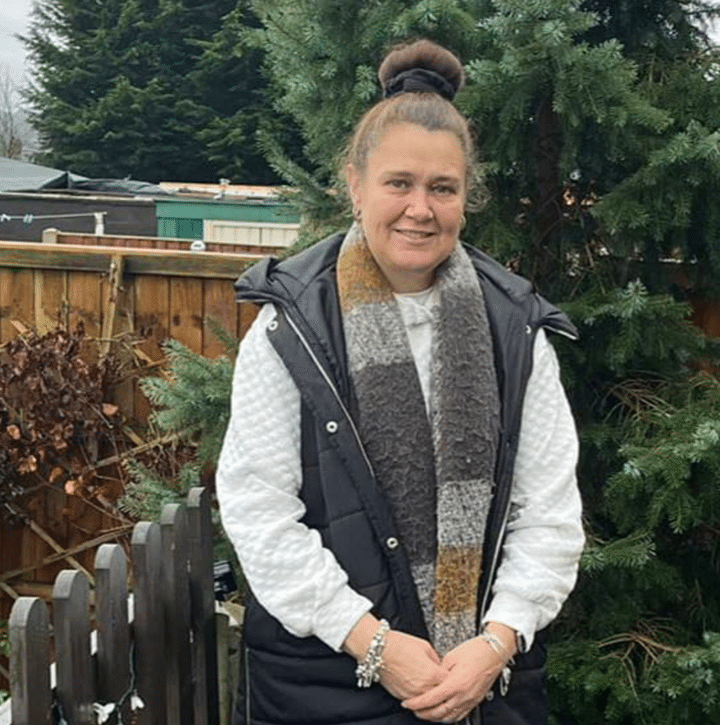 Tracy Lowe outside in a garden