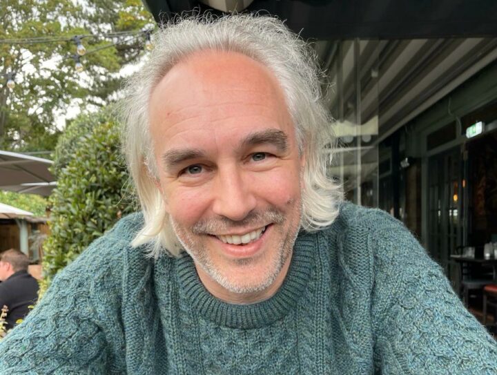 James Masters wearing teal jumper